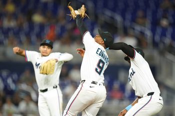 Aug 26, 2025; Miami, Florida, USA; Miami Marlins second baseman Xavier Edwards (9) catches a pop fly in the infield in the ninth inning against the Atlanta Braves at loanDepot Park. Mandatory Credit: Jim Rassol-Imagn Images
