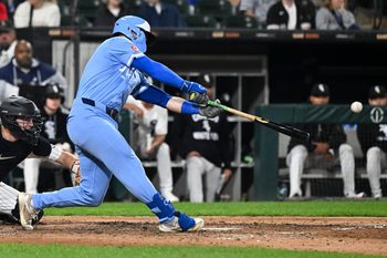 Aug 26, 2025; Chicago, Illinois, USA; Kansas City Royals second baseman Michael Massey (19) hits a two RBI single during the ninth inning against the Chicago White Sox at Rate Field. Mandatory Credit: Matt Marton-Imagn Images