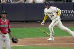 Milwaukee Brewers catcher William Contreras (24) hits a solo home run off of Arizona Diamondbacks pitcher Juan Burgos during the eighth inning of their game Wednesday, August 27, 2025 at American Family Field in Milwaukee, Wisconsin.