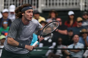 Mar 10, 2024; Indian Wells, CA, USA; Andrey Rublev runs to the net in his third round match against Jiri Lehecka (CZE) during the BNP Paribas Open at Indian Wells Tennis Garden. Mandatory Credit: Jonathan Hui-Imagn Images
