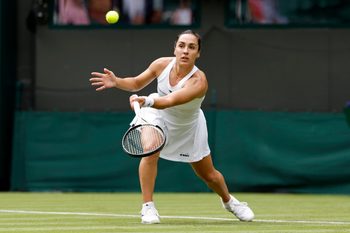 Jul 1, 2024; London, United Kingdom, Martina Trevisan (ITA) hits a forehand against Madison Keys (USA (not pictured) in a ladies singles match on day 1 in The Championships Wimbledon at the All England Lawn Tennis and Croquet Club. Mandatory Credit: Geoff Burke-Imagn Images