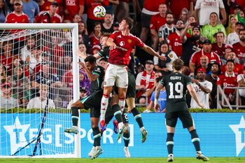 Aug 3, 2024; Columbia, South Carolina, USA; Manchester United midfielder Casemiro (18) heads the ball against Liverpool in the second half at Williams-Brice Stadium. Mandatory Credit: Jeff Blake-Imagn Images