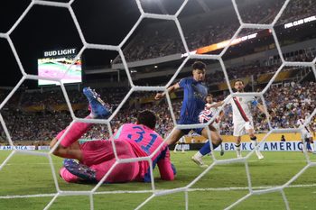 Jun 30, 2025; Orlando, Florida, USA; Al Hilal FC forward Marcos Leonardo (11) scores against Manchester City goalkeeper Ederson (31) during a round of 16 match of the 2025 FIFA Club World Cup at Camping World Stadium. Mandatory Credit: Nathan Ray Seebeck-Imagn Images
