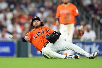 Jul 11, 2025; Houston, Texas, USA; Houston Astros starting pitcher Lance McCullers Jr. (43) throws from the ground but is unable to get an out on an infield single by Texas Rangers first baseman Jake Burger (not pictured) during the third inning at Daikin Park. Mandatory Credit: Troy Taormina-Imagn Images