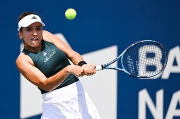 Jul 29, 2025; Montreal, QC, Canada; Camila Osorio (COL returns the ball to Dayana Yastremska (UKR) in second round play at IGA Stadium. Mandatory Credit: David Kirouac-Imagn Images