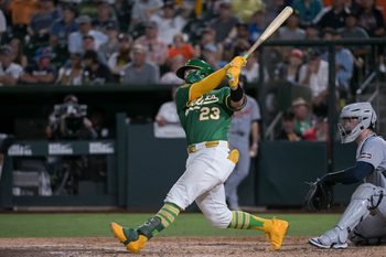 Aug 25, 2025; West Sacramento, California, USA; Athletics catcher Shea Langeliers (23) hits a grand slam against the Detroit Tigers during the seventh inning at Sutter Health Park. Mandatory Credit: Ed Szczepanski-Imagn Images