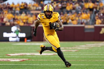 Aug 28, 2025; Minneapolis, Minnesota, USA; Minnesota Golden Gophers running back Darius Taylor (1) runs the ball against the Buffalo Bulls during the first half of the game at Huntington Bank Stadium. Mandatory Credit: Matt Krohn-Imagn Images