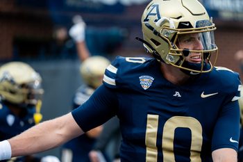 Akron Zips quarterback Ben Finley (10) stretches during warmups before the season opening game against Wyoming, Aug. 28, 2025, at InfoCision Stadium in Akron, Ohio.