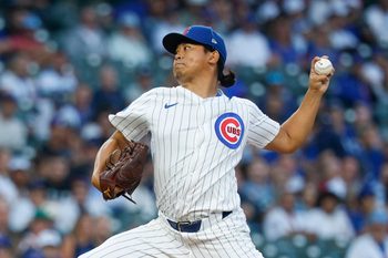 Sep 5, 2025; Chicago, Illinois, USA; Chicago Cubs starting pitcher Shota Imanaga (18) delivers a pitch against the Atlanta Braves during the first inning at Wrigley Field. Mandatory Credit: Kamil Krzaczynski-Imagn Images