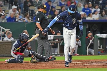 Sep 5, 2025; Kansas City, Missouri, USA;  Kansas City Royals third baseman Maikel Garcia (11) throws his bat to the ground after hitting a two-run home run in the third inning against the Minnesota Twins at Kauffman Stadium. Mandatory Credit: Peter Aiken-Imagn Images