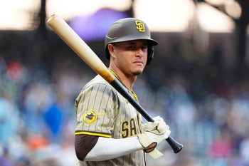 Sep 5, 2025; Denver, Colorado, USA; San Diego Padres third baseman Manny Machado (13) during the first inning against the Colorado Rockies at Coors Field. Mandatory Credit: Ron Chenoy-Imagn Images