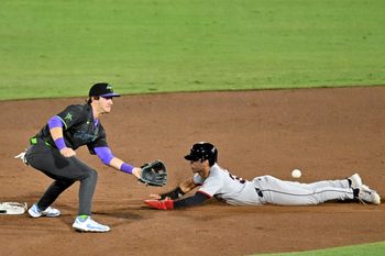 Sep 5, 2025; St. Petersburg, Florida, USA; Tampa Bay Rays shortstop Carson Williams (77) waits for the ball as Cleveland Guardians left fielder Steven Kwan (38) slides into second base for a stolen base in the sixth inning at George M. Steinbrenner Field. Mandatory Credit: Jonathan Dyer-Imagn Images