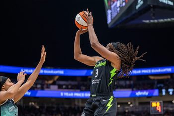 Sep 5, 2025; Seattle, Washington, USA;  Seattle Storm forward Nneka Ogwumike (3) shoots the ball against New York Liberty forward Isabelle Harrison (21) during the second half at Climate Pledge Arena. Mandatory Credit: Stephen Brashear-Imagn Images