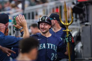 Sep 6, 2025; Cumberland, Georgia, USA; Seattle Mariners catcher Cal Raleigh (29) celebrates a home run hit against the Atlanta Braves during the ninth inning at Truist Park. Mandatory Credit: Jordan Godfree-Imagn Images