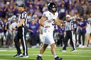 Sep 6, 2025; Manhattan, Kansas, USA; Army Black Knights quarterback Cale Hellums (3) limps to the sideline after scoring a touchdown in the third quarter against the Kansas State Wildcats at Bill Snyder Family Football Stadium. Mandatory Credit: Scott Sewell-Imagn Images