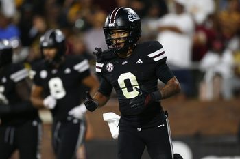 Sep 6, 2025; Starkville, Mississippi, USA; Mississippi State Bulldogs wide receiver Brenen Thompson (0) reacts after a touchdown during the fourth quarter against the Arizona State Sun Devils at Davis Wade Stadium at Scott Field. Mandatory Credit: Petre Thomas-Imagn Images