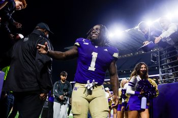 Sep 6, 2025; Seattle, Washington, USA; Washington Huskies running back Jonah Coleman (1) returns to the locker room following a victory against the UC Davis Aggies at Husky Stadium. Mandatory Credit: Joe Nicholson-Imagn Images