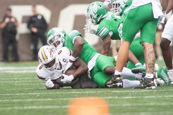 Western Michigan junior Jalen Buckley is brought down during the home-opening game against North Texas at Western Michigan University on Saturday, Sept. 6, 2025.