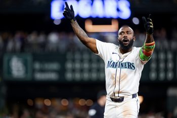 Sep 8, 2025; Seattle, Washington, USA; Seattle Mariners left fielder Randy Arozarena (56) reacts after hitting a single against the St. Louis Cardinals during the sixth inning at T-Mobile Park. Mandatory Credit: Joe Nicholson-Imagn Images