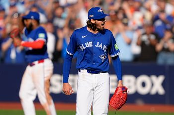 Sep 11, 2025; Toronto, Ontario, CAN; Toronto Blue Jays starting pitcher Kevin Gausman (34) reacts after a complete game win over the Houston Astros at Rogers Centre. Mandatory Credit: John E. Sokolowski-Imagn Images