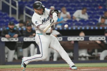 Sep 11, 2025; Miami, Florida, USA;  Miami Marlins designated hitter Agustin Ramirez (50) singles to left field in the first inning against the Washington Nationals at loanDepot Park. Mandatory Credit: Jim Rassol-Imagn Images
