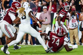 Sep 13, 2025; Columbia, South Carolina, USA; South Carolina Gamecocks running back Rahsul Faison (1) runs for a touchdown against the Vanderbilt Commodores in the first quarter at Williams-Brice Stadium. Mandatory Credit: Jeff Blake-Imagn Images