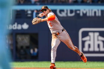 Sep 14, 2025; Toronto, Ontario, CAN; Baltimore Orioles shortstop Gunnar Henderson (2) throws to first base against the Toronto Blue Jays during the third inning in their MLB game at Rogers Centre. Mandatory Credit: Kevin Sousa-Imagn Images