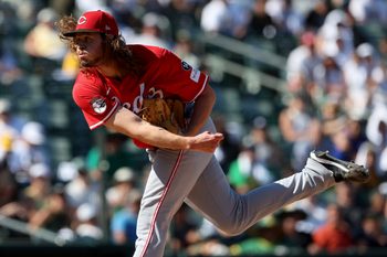 Sep 14, 2025; West Sacramento, California, USA; Cincinnati Reds pitcher Scott Barlow (58) throws a pitch against the Athletics during the eighth inning at Sutter Health Park. Mandatory Credit: Dennis Lee-Imagn Images