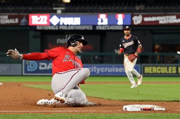 Sep 16, 2025; Washington, District of Columbia, USA; Atlanta Braves first base Matt Olson (28) slides into third base with a three run triple against the Washington Nationals during the tenth inning at Nationals Park. Mandatory Credit: Geoff Burke-Imagn Images
