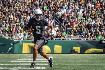 Oregon Ducks quarterback Dante Moore carries the ball as the Oregon Ducks host the Oregon State Beavers Sept. 20, 2025, at Autzen Stadium in Eugene, Oregon.