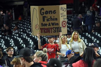 Sep 20, 2025; Denver, Colorado, USA; A young fan holds a sign after a win by the Los Angeles Angels over the Colorado Rockies at Coors Field. Mandatory Credit: Christopher Hanewinckel-Imagn Images