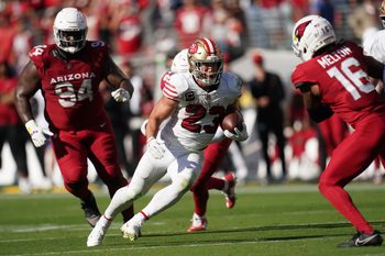 Sep 21, 2025; Santa Clara, California, USA; San Francisco 49ers running back Christian McCaffrey (23) carries the ball against the Arizona Cardinals during the second half at Levi's Stadium. Mandatory Credit: Cary Edmondson-Imagn Images
