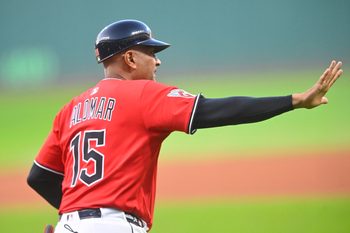 Sep 25, 2025; Cleveland, Ohio, USA; Cleveland Guardians first base coach Sandy Alomar Jr. (15) runs on the field in the first inning against the Detroit Tigers at Progressive Field. Mandatory Credit: David Richard-Imagn Images