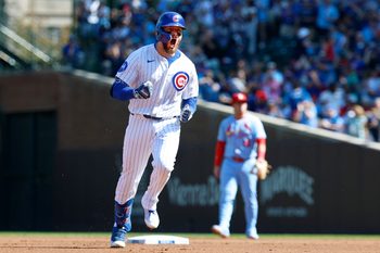 Sep 27, 2025; Chicago, Illinois, USA; Chicago Cubs first baseman Michael Busch (29) rounds the bases after hitting a solo home run against the St. Louis Cardinals during the first inning at Wrigley Field. Mandatory Credit: Kamil Krzaczynski-Imagn Images