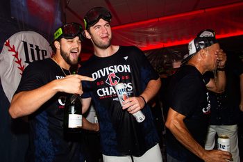 Sep 28, 2025; Cleveland, Ohio, USA;  Cleveland Guardians starting pitcher Slade Cecconi (44) and starting pitcher Gavin Williams, middle, celebrate after the Guardians won the American League Central Division at Progressive Field. Mandatory Credit: Ken Blaze-Imagn Images