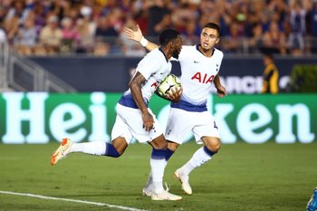 Jul 28, 2018; Pasadena, CA, USA; Tottenham Hotspur midfielder Georges-Kevin N'Koudou (left) celebrates his second half goal with midfielder Anthony Georgiou (42) against FC Barcelona during an International Champions Cup soccer match at Rose Bowl. Mandatory Credit: Mark J. Rebilas-Imagn Images