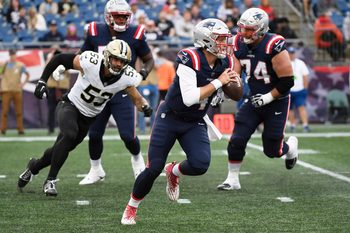 Oct 8, 2023; Foxborough, Massachusetts, USA;  New England Patriots quarterback Bailey Zappe (4) runs with the ball during the second half against the New Orleans Saints at Gillette Stadium. Mandatory Credit: Bob DeChiara-Imagn Images