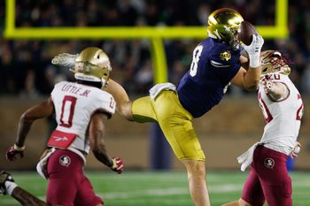 Notre Dame tight end Mitchell Evans (88) makes a catch that would later be ruled incomplete during a NCAA college football game against Florida State at Notre Dame Stadium on Saturday, Nov. 9, 2024, in South Bend.