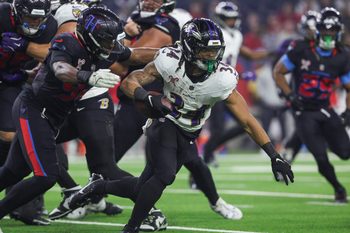 Dec 25, 2024; Houston, Texas, USA;  Baltimore Ravens running back Keaton Mitchell (34) runs with the ball during the fourth quarter against the Houston Texans at NRG Stadium. Mandatory Credit: Troy Taormina-Imagn Images