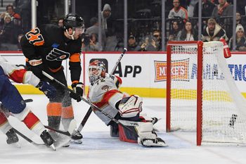 Jan 13, 2025; Philadelphia, Pennsylvania, USA; Philadelphia Flyers left wing Noah Cates (27) scores a goal past Florida Panthers center Eetu Luostarinen (27) during the third period at Wells Fargo Center. Mandatory Credit: Eric Hartline-Imagn Images