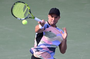 Aug 1, 2025; Toronto, ON, Canada; Aleksandar Vukic (AUS)  plays a shot against Frances Tiafoe (USA) during third round play at Sobeys Stadium. Mandatory Credit: Dan Hamilton-Imagn Images