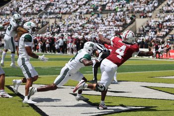 Aug 23, 2025; Honolulu, Hawaii, USA; While being guarded by Hawaii Rainbow Warriors defensive back Elijah Palmer (4), Stanford Cardinal wide receiver Jordan Onovughe (4) can’t pull in and end zone catch during the first half of an NCAA college football game at Clarence T.C. Ching Athletics Complex. Mandatory Credit: Marco Garcia-Imagn Images