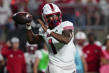 Aug 28, 2025; Madison, Wisconsin, USA;  Miami (OH) RedHawks quarterback Dequan Finn (1) throws a pass during the third quarter against the Wisconsin Badgers at Camp Randall Stadium. Mandatory Credit: Jeff Hanisch-Imagn Images