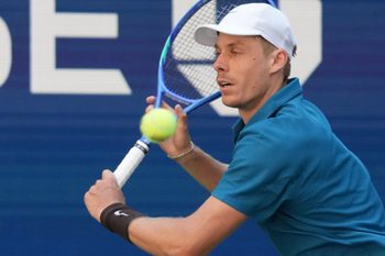 Aug 30, 2025; Flushing, NY, USA;  Denis Shapovalov (CAN) hits to Jannik Sinner (ITA) (not pictured) on day seven of the 2025 U.S. Open tennis tournament at the USTA Billie Jean King National Tennis Center. Mandatory Credit: Robert Deutsch-Imagn Images