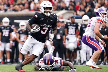 Cincinnati Bearcats running back Tawee Walker (3) runs the ball in the second quarter of a NCAA men’s college football game between the Cincinnati Bearcats and Northwestern State Demons, Saturday, Sept. 13, 2025, at Nippert Stadium in Cincinnati.