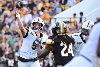 Appalachian State Mountaineers quarterback AJ Swann (5) makes a pass against the Southern Miss Golden Eagles during the first quarter at M.M. Roberts Stadium in Hattiesburg, Mississippi, on September 13, 2025.