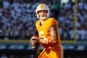 Sep 27, 2025; Starkville, Mississippi, USA; Tennessee Volunteers quarterback Joey Aguilar (6) looks to pass the ball against the Mississippi State Bulldogs during the second half at Davis Wade Stadium at Scott Field. Mandatory Credit: Wesley Hale-Imagn Images