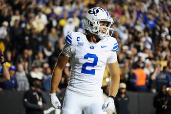 Sep 27, 2025; Boulder, Colorado, USA; Brigham Young Cougars wide receiver Chase Roberts (2) reacts to his touchdown reception in the third quarter against the Colorado Buffaloes at Folsom Field. Mandatory Credit: Ron Chenoy-Imagn Images