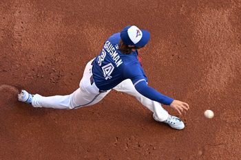 Sep 28, 2025; Toronto, Ontario, CAN;  Toronto Blue Jays starting pitcher Kevin Gausman (34) warms up before playing the Tampa Bay Rays at Rogers Centre. Mandatory Credit: Dan Hamilton-Imagn Images