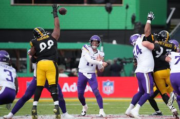 Sep 28, 2025; Dublin, Ireland; Minnesota Vikings quarterback Carson Wentz (11) throws the ball against Pittsburgh Steelers defensive tackle Derrick Harmon (99) during an NFL International Series game at Croke Park. Mandatory Credit: Kirby Lee-Imagn Images